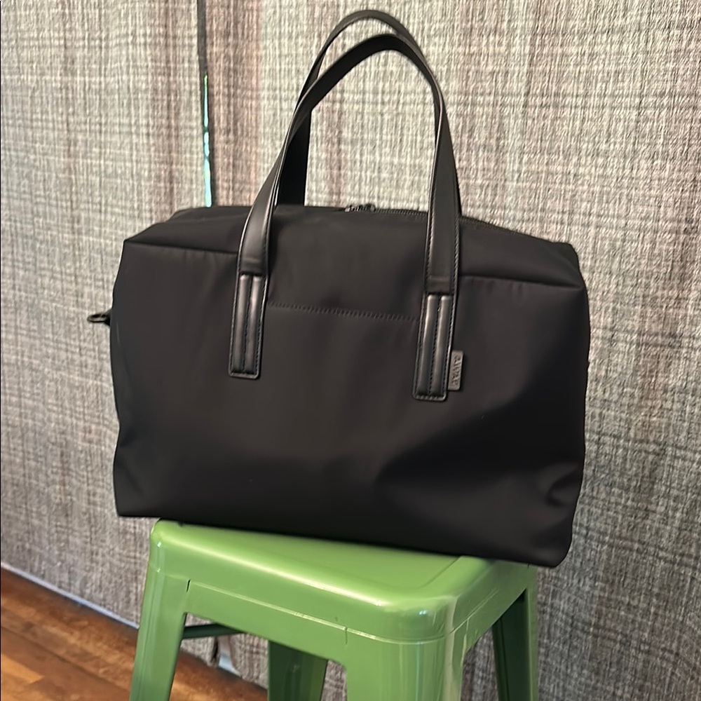 Away Black Duffel Bag with Sleek Design